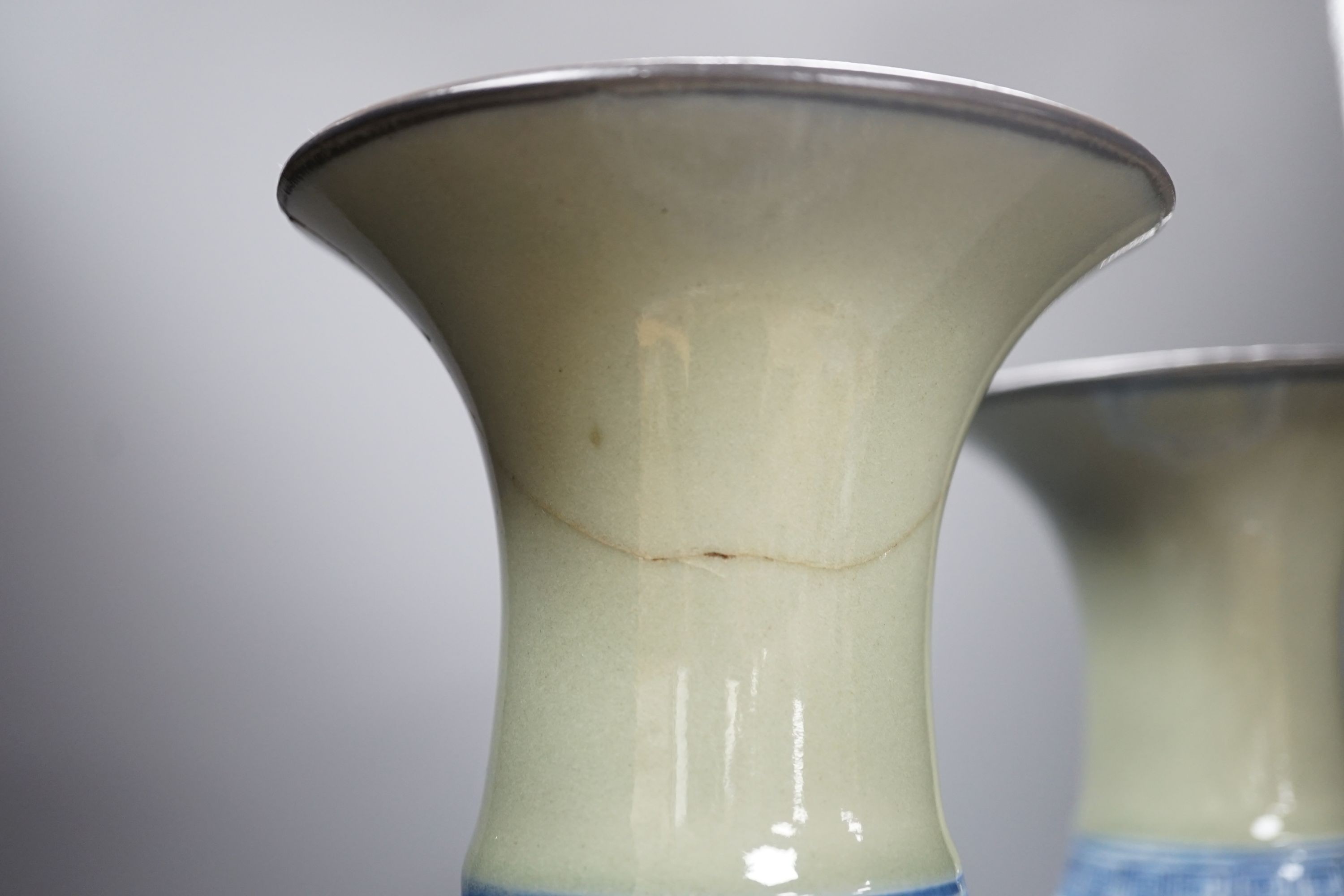 A pair of Chinese celadon ground underglaze blue vases, early 20th century-44cm high.